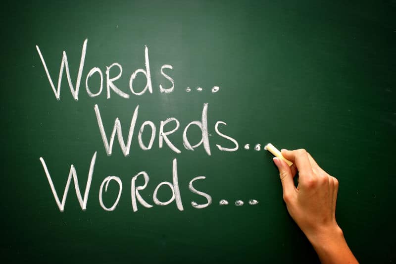 A classroom board with words, words, words written in chalk
