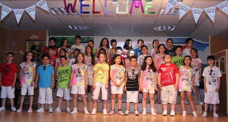 kids onstage at an end of term show